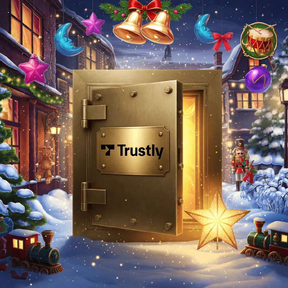 Trustly logo on a Christmas scene with a golden vault door with a glowing star